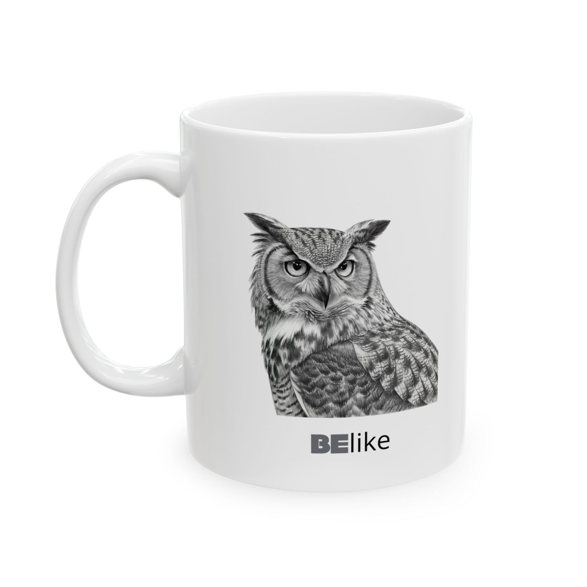 White ceramic mug with owl design and quote