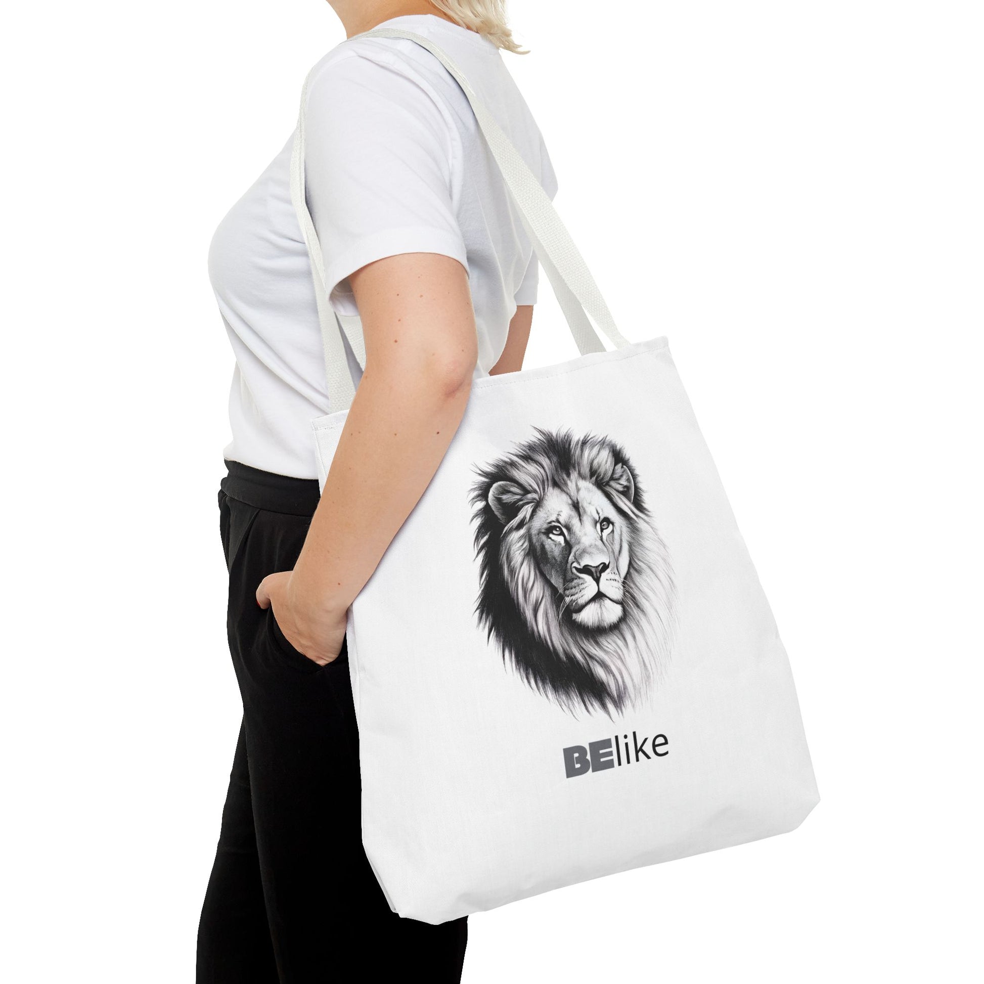 Black and white lion design on tote bag with motivational quote